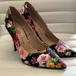 Beautiful high heeled floral pumps. 7 wide. Worn once. Penny Kenny.